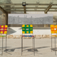 Yassir Ameen’s ink drawings, displayed here in the courtyard of the Jordan Museum, depict Amman in painstaking detail.